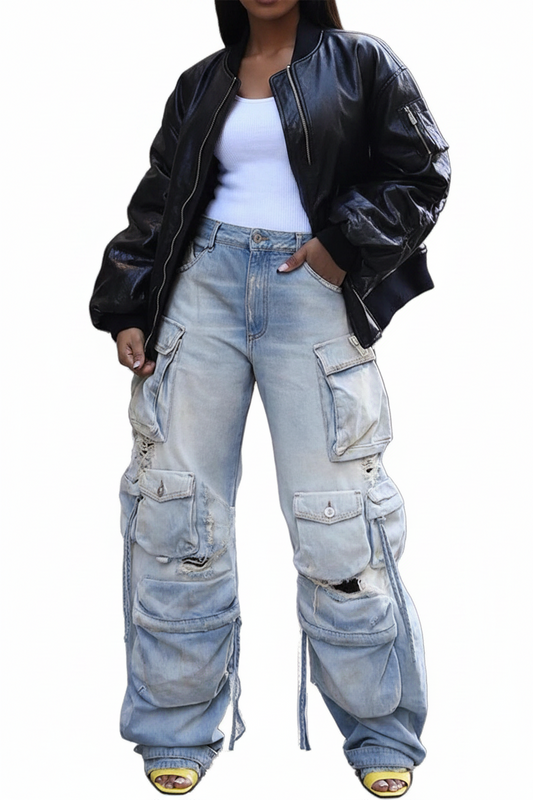 Light blue cargo pants with multiple pockets worn by a person.